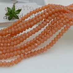 Filo rondelle briolette in mezzi cristalli albicocca 3 x 4 mm 125-145pz Gioie d'Oriente