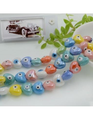 Perle cuore con occhio greco in ceramica smaltata colore mix 12x14mm 25pz GDO