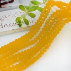 Filo rondelle briolette in mezzi cristalli giallo scuro trasparente 3 x 4 mm 125-145pz Gioie d'Oriente