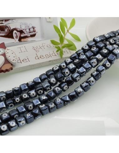 Filo perle a cubo con occhio greco in ceramica colore nero 7mm 55pz GDO