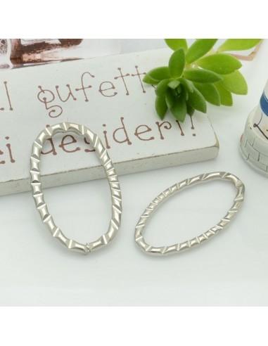 Connettori ovali vuoti con righe due misure 4pz in metallo argento rodiato - GDO