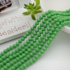 Filo rondelle briolette in mezzi cristalli verde 3 x 4 mm 125-145pz Gioie d'Oriente