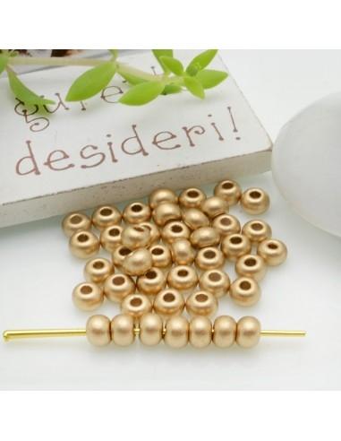 Perline di vetro forma rondella colore oro opacco 3x4mm 70pz GDO