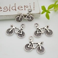 Ciondoli biciclette in lega di metallo rodio 15x13mm 9pz Gioie d'Oriente