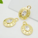 Ciondolo medaglietta in ottone oro con zircone centrale 12.5x18mm 1pz Gioie d'Oriente