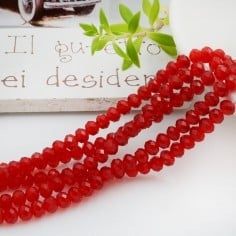 Filo rondelle briolette in mezzi cristalli rosso trasparente 3 x 4 mm 125-145pz Gioie d'Oriente