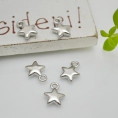 Ciondoli stelle lisce in ottone oro e argento rodiato 6x7 mm 2pz Gioie d'Oriente 2