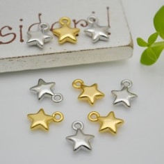 Ciondoli stelle lisce in ottone oro e argento rodiato 6x7 mm 2pz Gioie d'Oriente