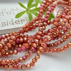 Filo rondelle briolette in mezzi cristalli rosso oro 3 x 4 mm 120pz Gioie d'Oriente