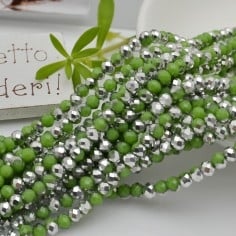 Filo rondelle briolette in mezzi cristalli verde argento 3 x 4 mm 120pz Gioie d'Oriente
