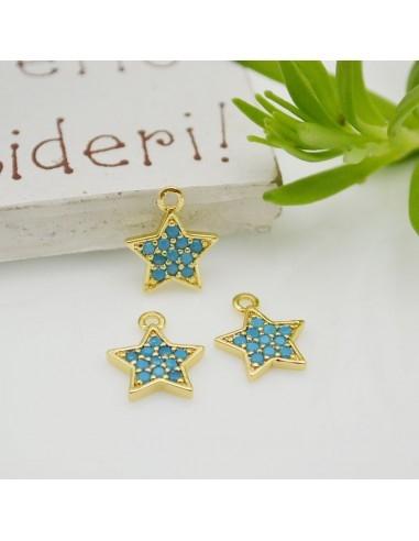 Ciondolo stella in rame dorato con zirconi turchesi 8x10 mm 1pz Gioie d'Oriente