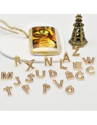 Ciondolo lettera in rame oro con zircone 7x11mm 1pz Gioie d'Oriente