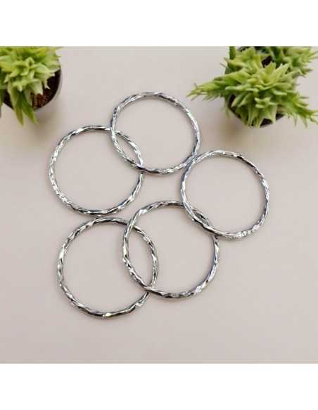 Anelle chiuse torcigliate in argento 925 placcato argento rodio 12 mm 10pz Gioie d'Oriente
