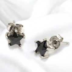 Orecchini perno a stella con cristallo nero in argento 925% da 7 mm