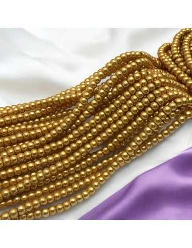 Filo di Perline di vetro a rondella dorato 3x4mm 135pz |GDO