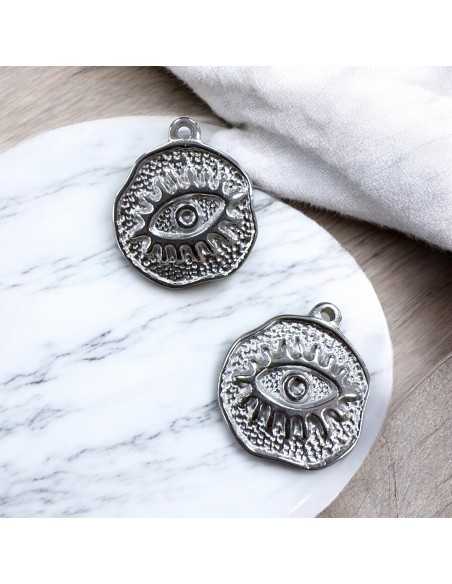 Ciondolo medaglia irregolare con occhio in acciaio inox variante acciaio 19x22 mm Gioie d'Oriente