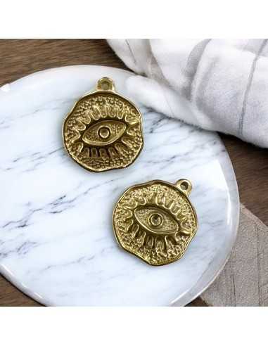 Ciondolo medaglia irregolare con occhio in acciaio inox variante oro 19x22 mm Gioie d'Oriente