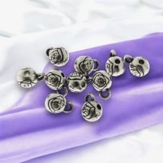 Charms roselline decorative in metallo argento 9x6mm 10pz Gioie d'Oriente