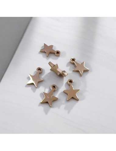 Mini ciondoli stella in acciaio oro rosa 4x6 mm 10pz Gioie d'Oriente