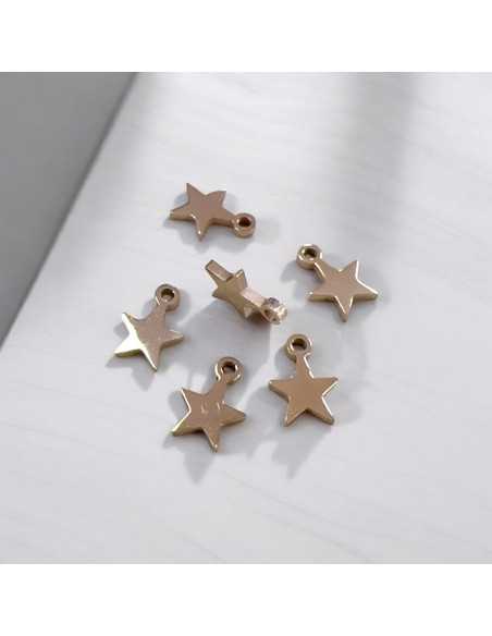 Mini ciondoli stella in acciaio oro rosa 4x6 mm 10pz Gioie d'Oriente