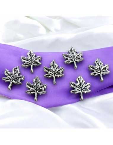 Ciondoli foglie cinque punte argento in metallo 13x27mm 7pz Gioie d'Oriente