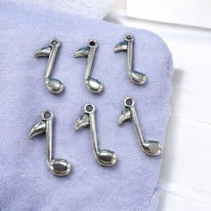 Ciondoli nota musicale in metallo zamak argento 23x10 mm 6pz Gioie d'Oriente