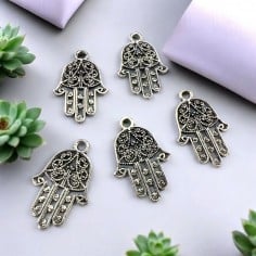 Ciondoli Mano di Fatima fantasia zama 14x21 mm 8pz Gioie d'Oriente