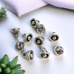 Ciondoli fantasia forati in lega di metallo argento 6.5x7.5 mm 10pz Gioie d'Oriente