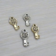 Ciondolo chiave con cuore in ottone argento e oro 19x8mm 1pz Gioie d'Oriente