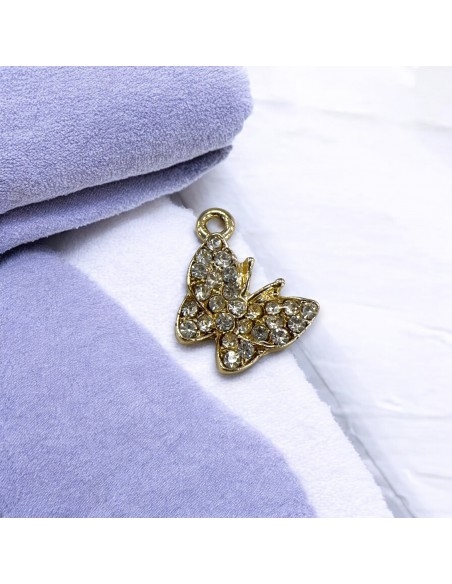 Ciondolo farfalla con strass in zama oro 16x18 mm 1pz Gioie d'Oriente