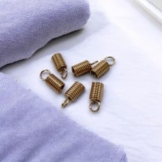 Terminale a molla acciaio inox PVD oro rosa per cordoni 1.5-5mm 10pz | GDO 2
