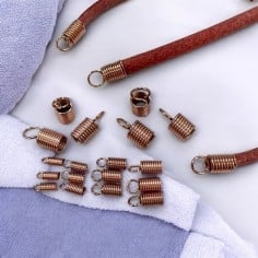 Terminale a molla acciaio inox PVD oro rosa per cordoni 1.5-5mm 10pz | GDO