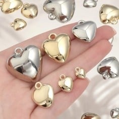 Ciondoli cuore bombato in Argentone oro argento mix misure Gioie d'Oriente