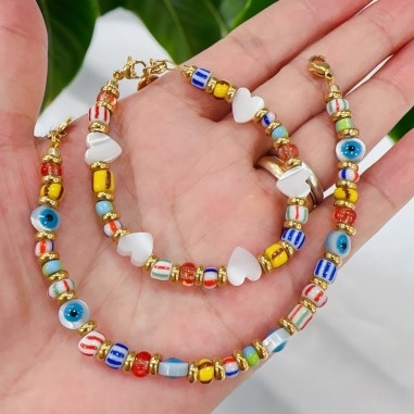 bracciale nodo cobra, con distanziatori in madreperla, perline colorate, marchio Gioie d'Oriente