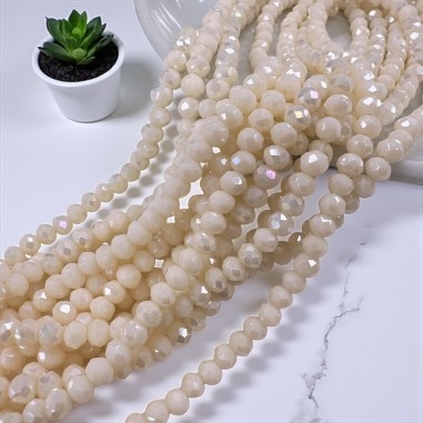 Briolette mezzi cristalli panna AB, sfaccettate a rondelle 3x4mm, 125-145 pezzi, marchio Gioie d'Oriente