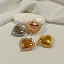 Ciondolo cuore mezzo bombato in acciaio inossidabile 15x14mm 1pz Gioie d'Oriente