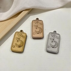 Ciondolo rettangolare luna e stelle in acciaio 13x26 mm 1pz colori vari Gioie d'Oriente