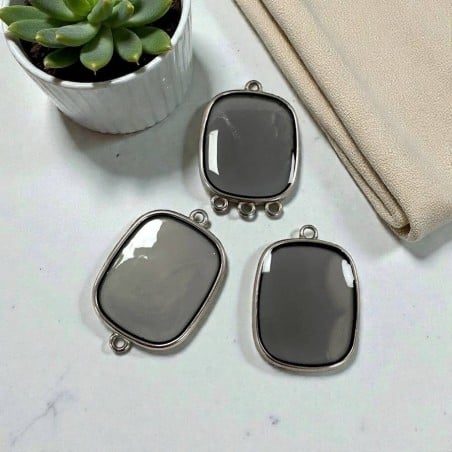 Ciondolo piastra in resina Grigio trasparente e Acciaio rodio 22x30mm - Vari modelli  | GDO