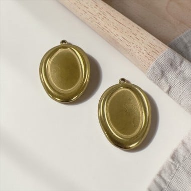 Ciondolo irregolare base resina in acciaio inox oro 25x35mm 1pz Gioie d'Oriente