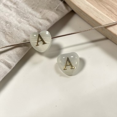 Cuore con lettera dell'Alfabeto in...