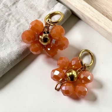 Ciondolo margherita 12mm in cristalli sfaccettati arancione e acciaio dorato GDO