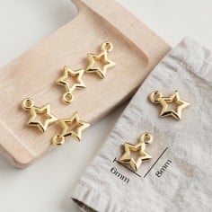 Ciondoli stella vuota in ottone oro 6x8 e 10x12 mm 2pz Gioie d'Oriente 2
