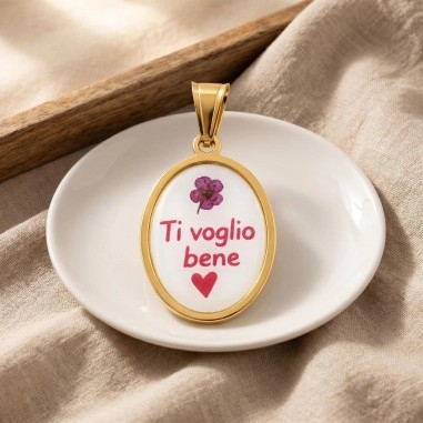 Ciondolo ovale con scritta "Ti voglio bene" in Acciaio dorato 15x23mm 1pz | GDO