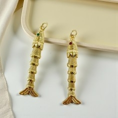 Ciondolo a forma di Pesce allungato mobile in ottone dorato con Occhio strass colorato 12x43mm 1pz | GDO