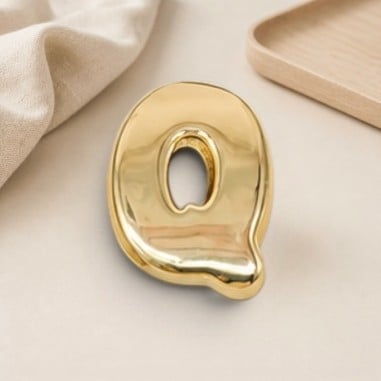 Distanziatore Lettera iniziale Q bombata in ottone dorato 15x20mm vuoto all'interno foro 3.5x14mm 1pz | GDO