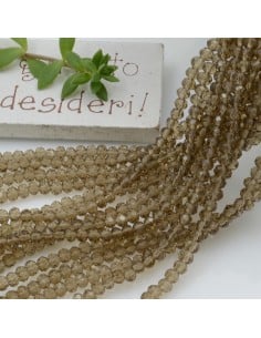 Filo rondelle briolette in mezzi cristalli fumé scuro 2.5 x 3.5 mm 125-145pz Gioie d'Oriente