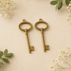 Ciondoli chiavi oro in metallo 53x20 mm 2pz Gioie d'Oriente