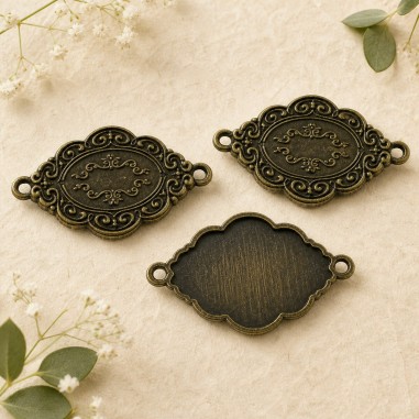 Ciondoli targhette Handmade in metallo bronzo 41x26 mm 3pz Gioie d'Oriente