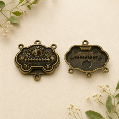 Ciondoli centrali con 4 fori in metallo bronzo 34x31 mm 2pz Gioie d'Oriente